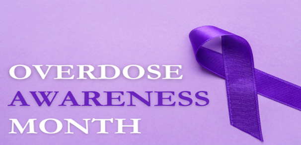 Photo of purple ribbon with the text "Overdose Awareness Month"
